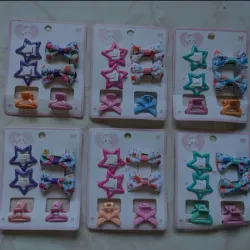 Paquete de estrellas, lazos y pellizcos