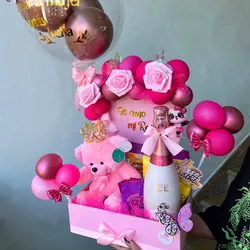 Caja con oso y botella