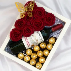 Caja blanca con botella 