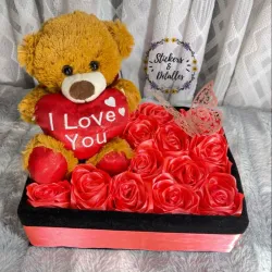 14 rosas y peluche