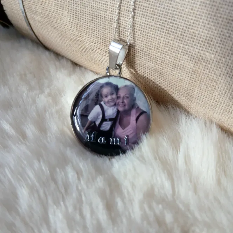 Dije Aro de acero plateado