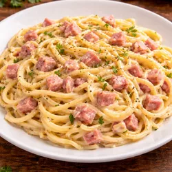 Espagueti con jamón y queso