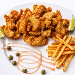 Minutas empanizadas con guarnición