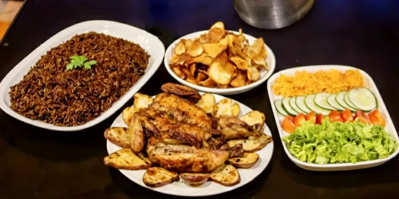 Pollo entero asado + 1 caja de cerveza 