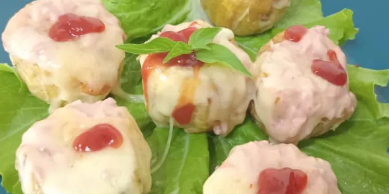Tostones Rellenos con jamón y Queso Gouda gratinado