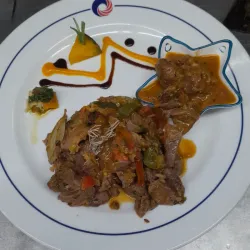 Guiso de Pierna S/H de Cordero al Chilindron