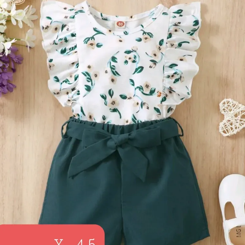 Short verde blusa blanca flores