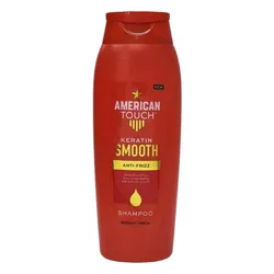 champú rojo de la marca American Touch con fórmula de keratina para reducir el frizz.