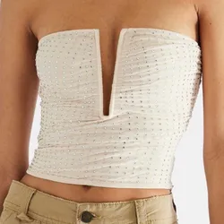 Top blanco escotado de brillos