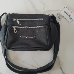 Cartera Aeropostale negra doble bolsillo
