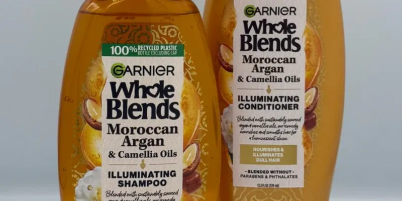 Garnier Whole Blends - Champú iluminador de aceites marroquíes de argán y camelia, para un brillo sedoso, 12.5 onzas líquidas,