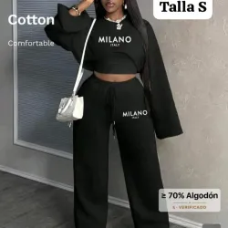 conjunto deportivo negro de dos piezas incluye un top corto y pantalones de pierna ancha