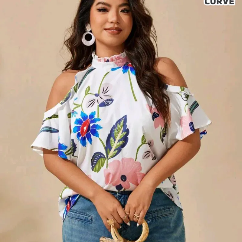Blusa blanca con flores. Talla 1xl.