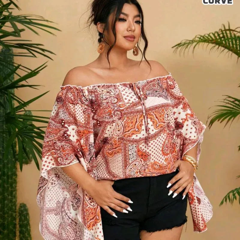 Blusa estampada blanca y carmelita. Talla 1xl