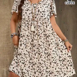 Vestido beige de puntos carmelitas y negros. Talla 1xl