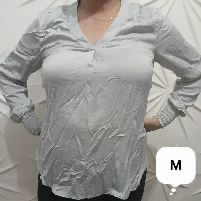Blusa gris mangas largas