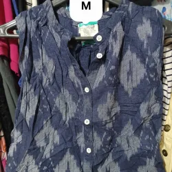 Blusa tipo chaqueta sin mangas de mezclilla