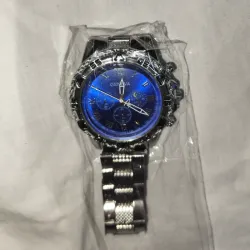 Reloj manilla metálica
