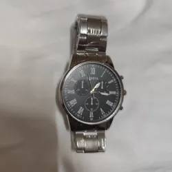 Reloj manilla metálica