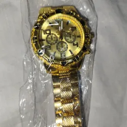 Reloj manilla metálica