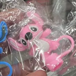 Tapas para absorbente rosada