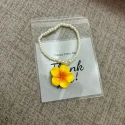 Pulsera de perlas de flor