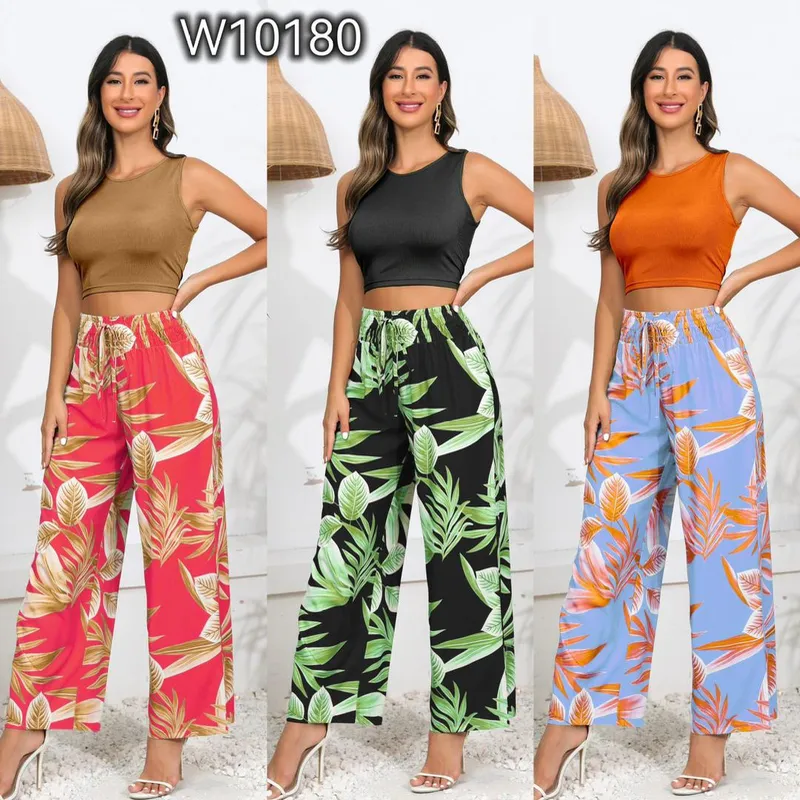 Pantalón ancho estampado + blusa corta