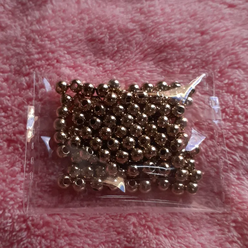 Balines de plastimetal dorados 4 mm