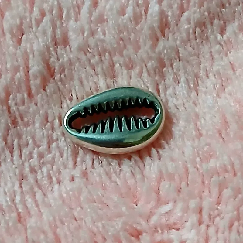 Caracol de metal