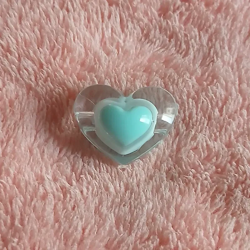 Corazón grande transparente centro verde