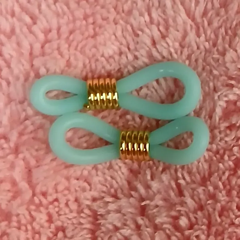 Gomas de espejuelos aqua con herraje dorado