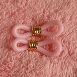 Gomas de espejuelos rosa con herraje dorado