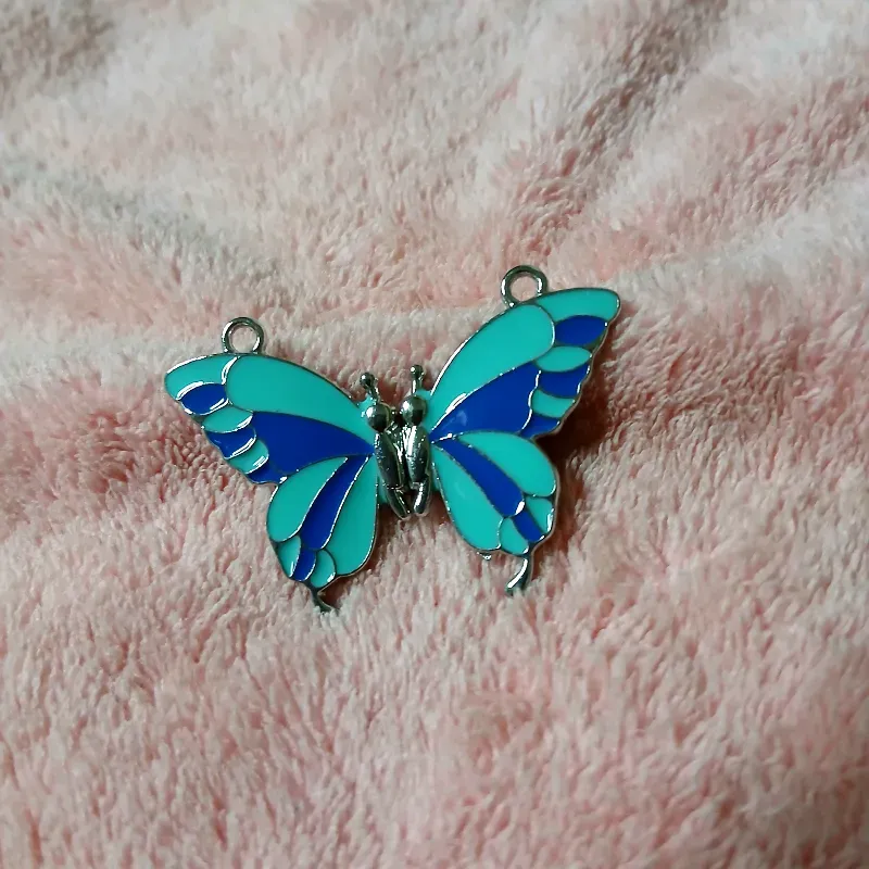 Mariposa imantada azul y verde azul