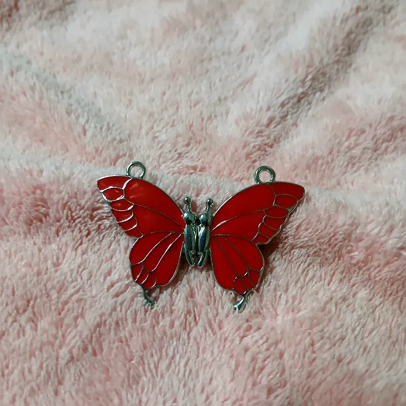Mariposa imantada roja