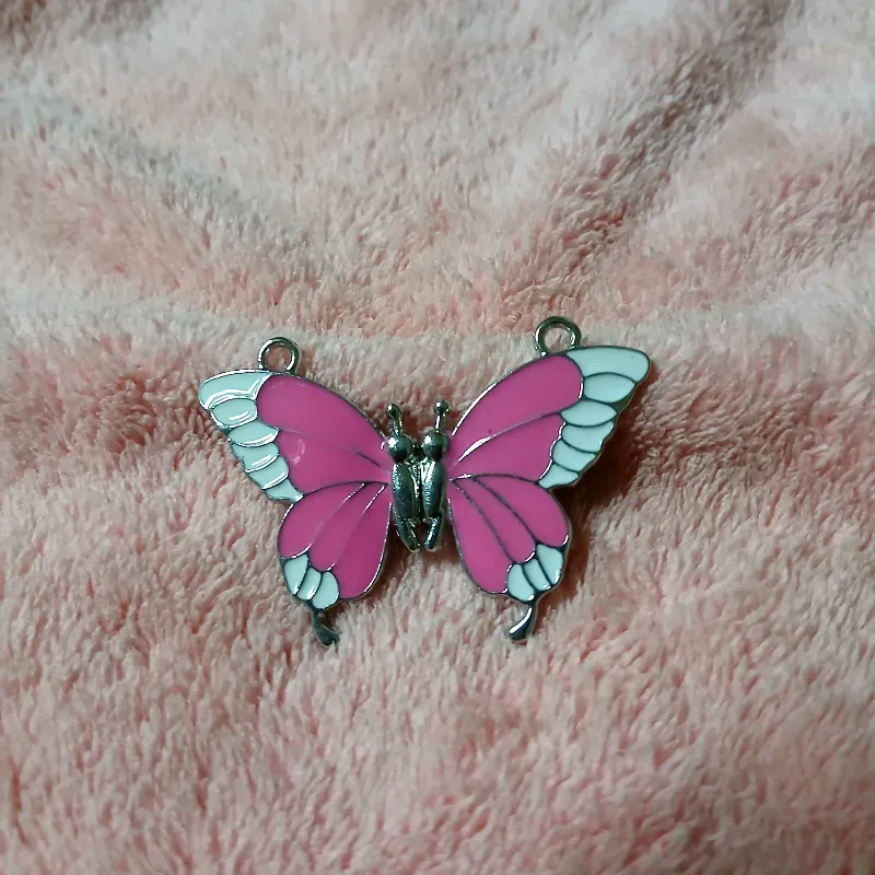 Mariposa imantada rosa y blanco