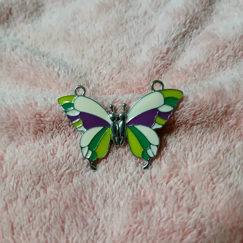 Mariposa imantada verde y morada