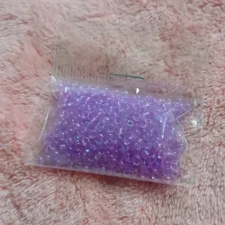 Mostacillas moradas tornasol transparente