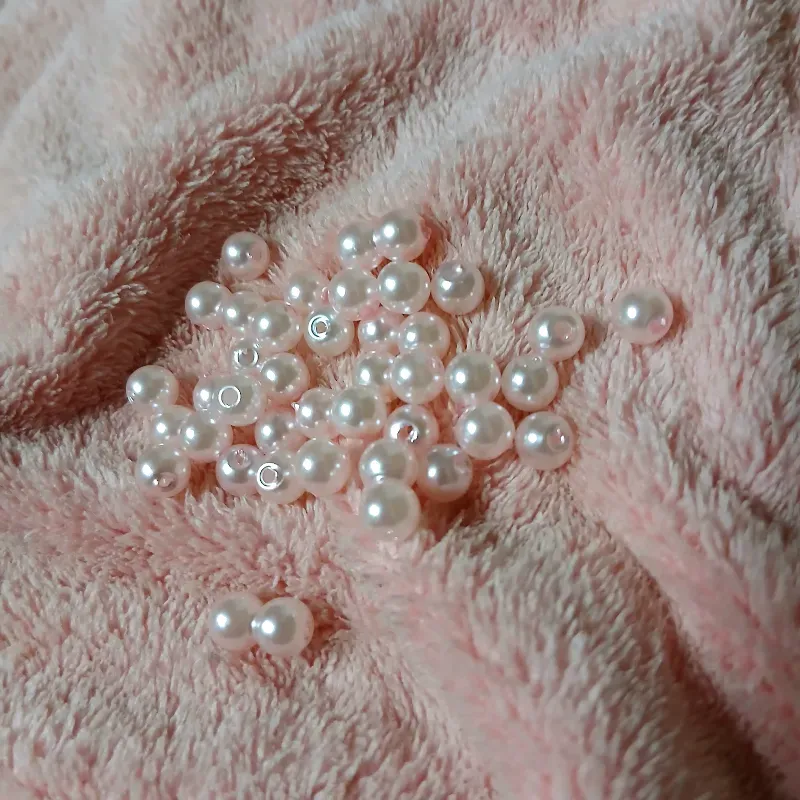 Perlas plásticas 6 mm rosadas