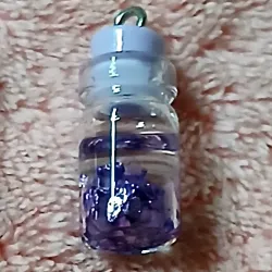 Pomito fluorescente morado