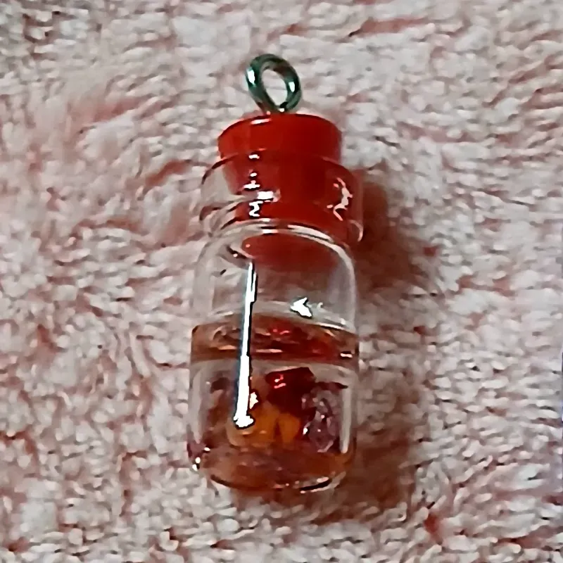 Pomito fluorescente rojo