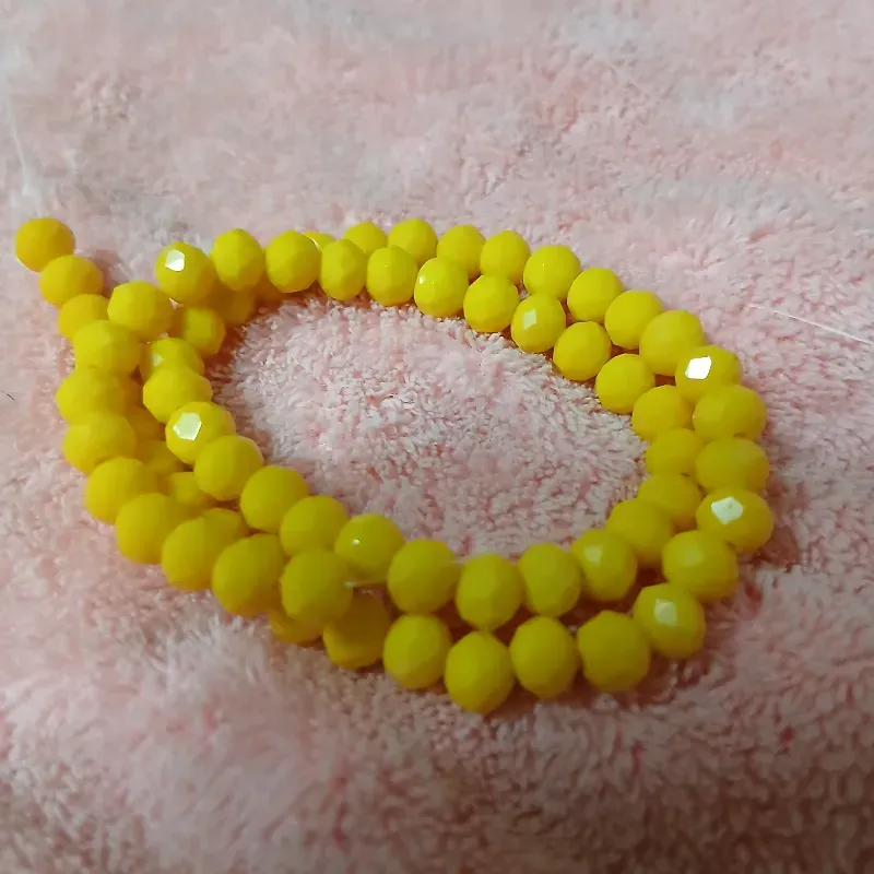 Swaroskis sueltos 6 mm amarillo mate