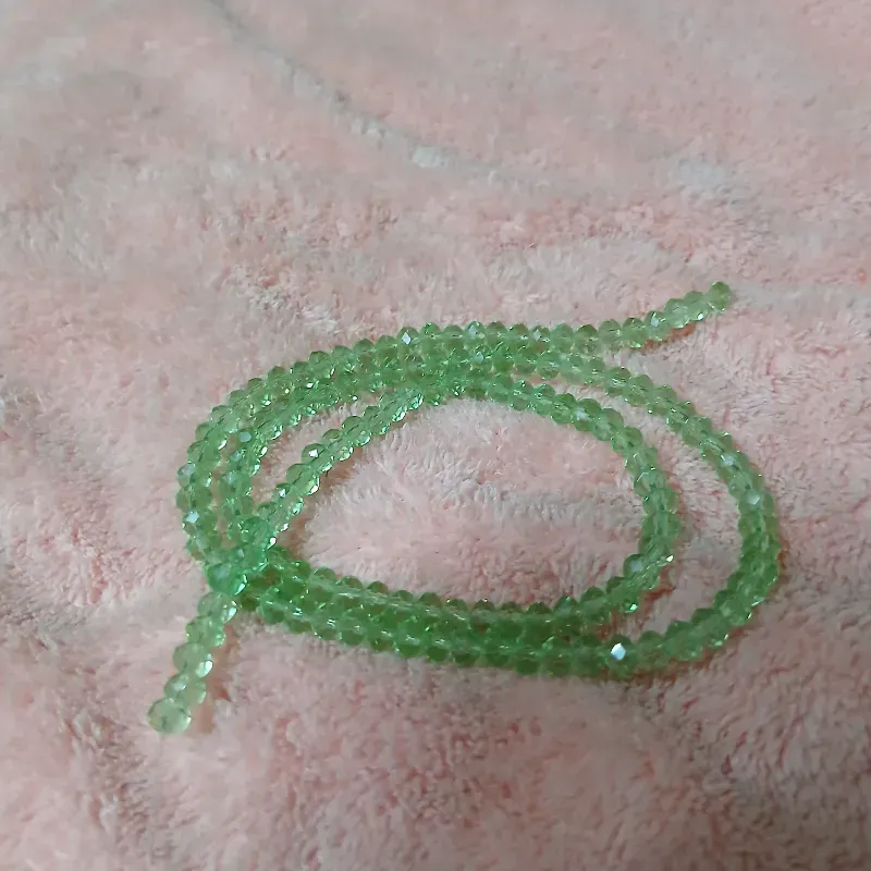 Swaroskis tira 4 mm verde claro transparente