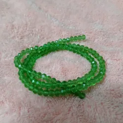 Swaroskis tira 4 mm verde oscuro transparente
