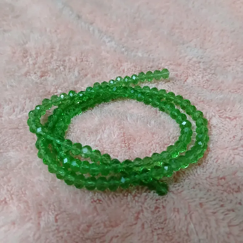 Swaroskis tira 4 mm verde oscuro transparente