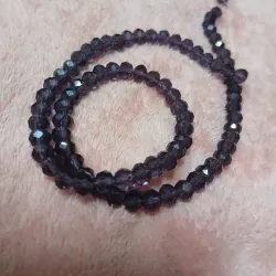 Swaroskis tira 6 mm morado oscuro transparente