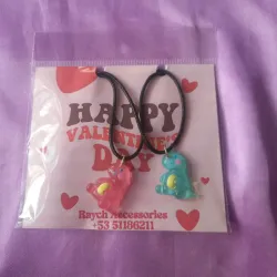 Pareja de collares dinosaurios