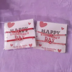 Pulseras tejidas con corazón rojo