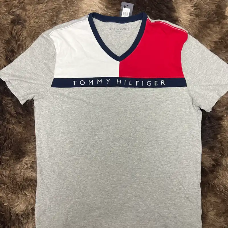 Tommy talla L