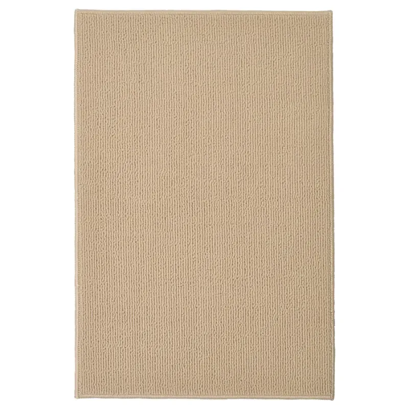 Alfombra beige de baño