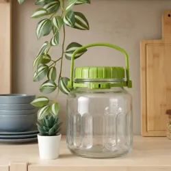 Pote de cristal con tapa y asa